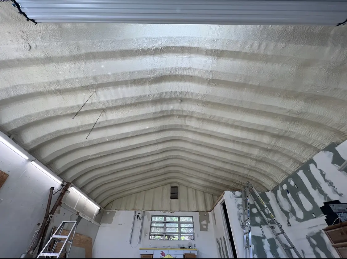 Spray polyurethane foam applied to the underside of a metal roof deck in Bismarck